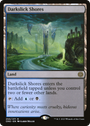 Darkslick Shores [Phyrexia: All Will Be One] - Español